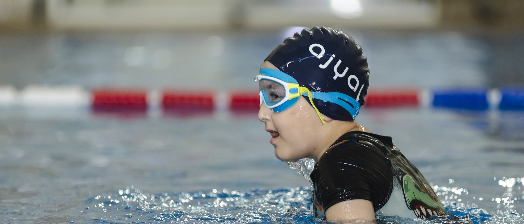 Children in a swimming lesson in the school’s indoor pool