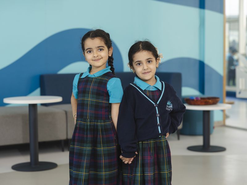 Two pupils in the school atrium