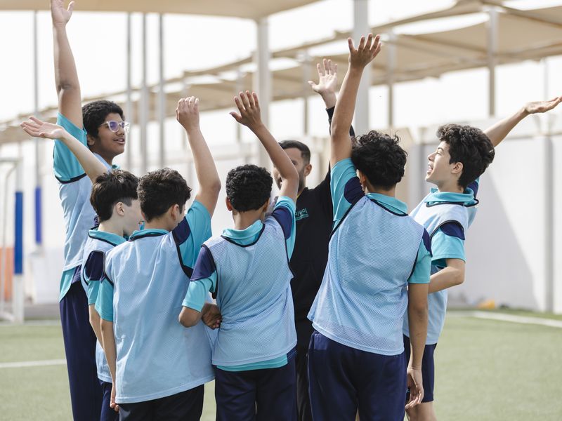 A team celebrating together after a match